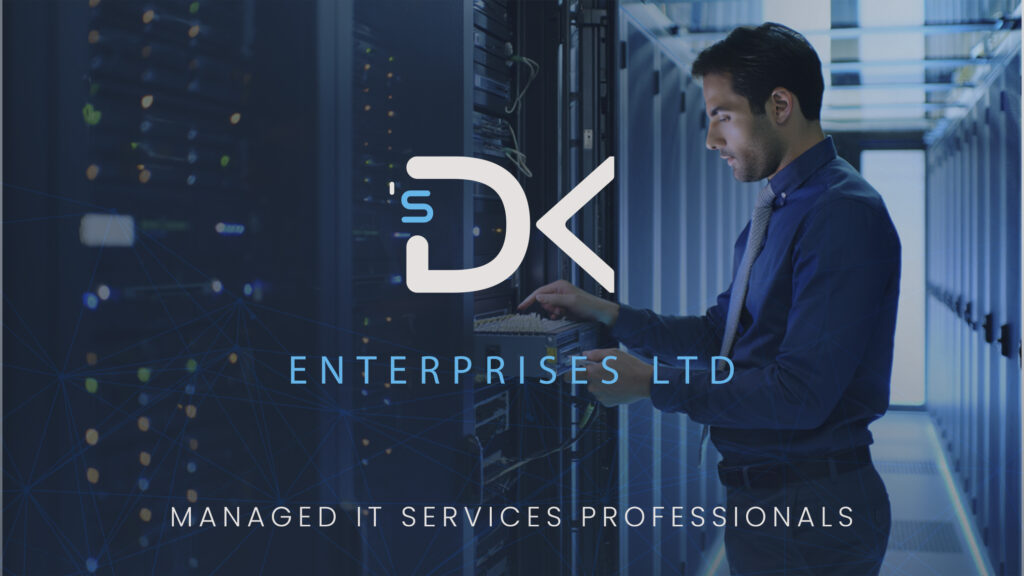 Managed IT services professional from DKs Enterprises LTD working in a server room.