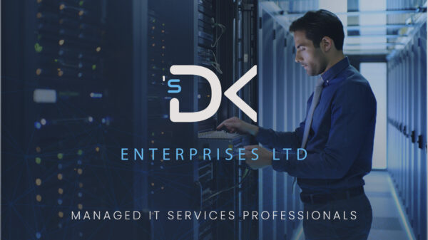 Managed IT services professional from DKs Enterprises LTD working in a server room.
